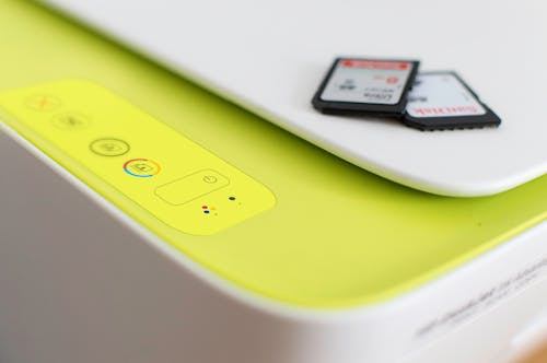An image of colorful jars of jam on a shelf