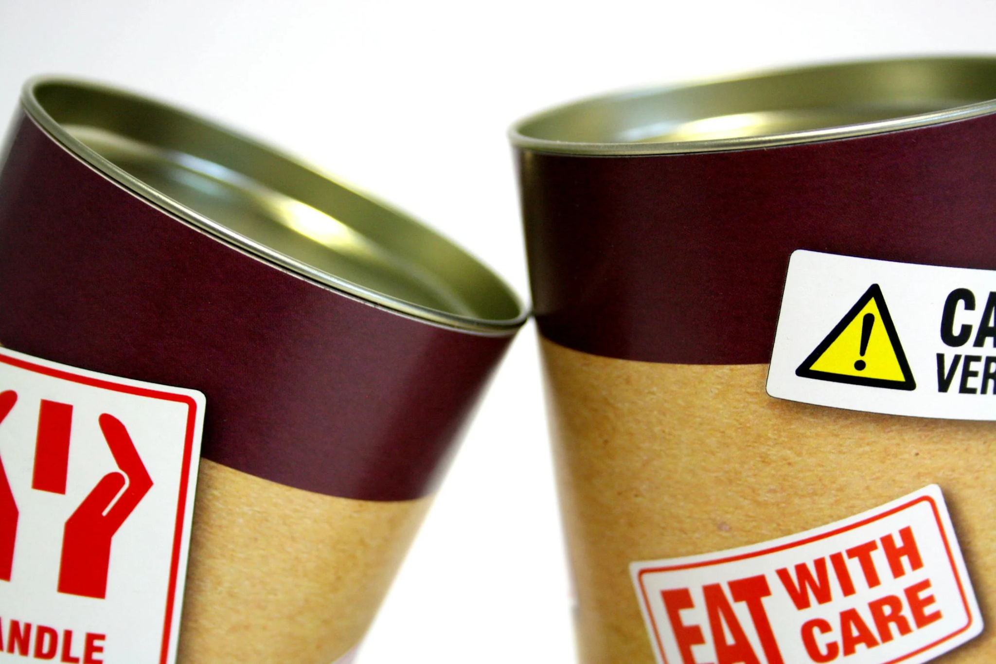 Two cans with labels