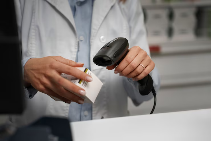 A person scanning a barcode